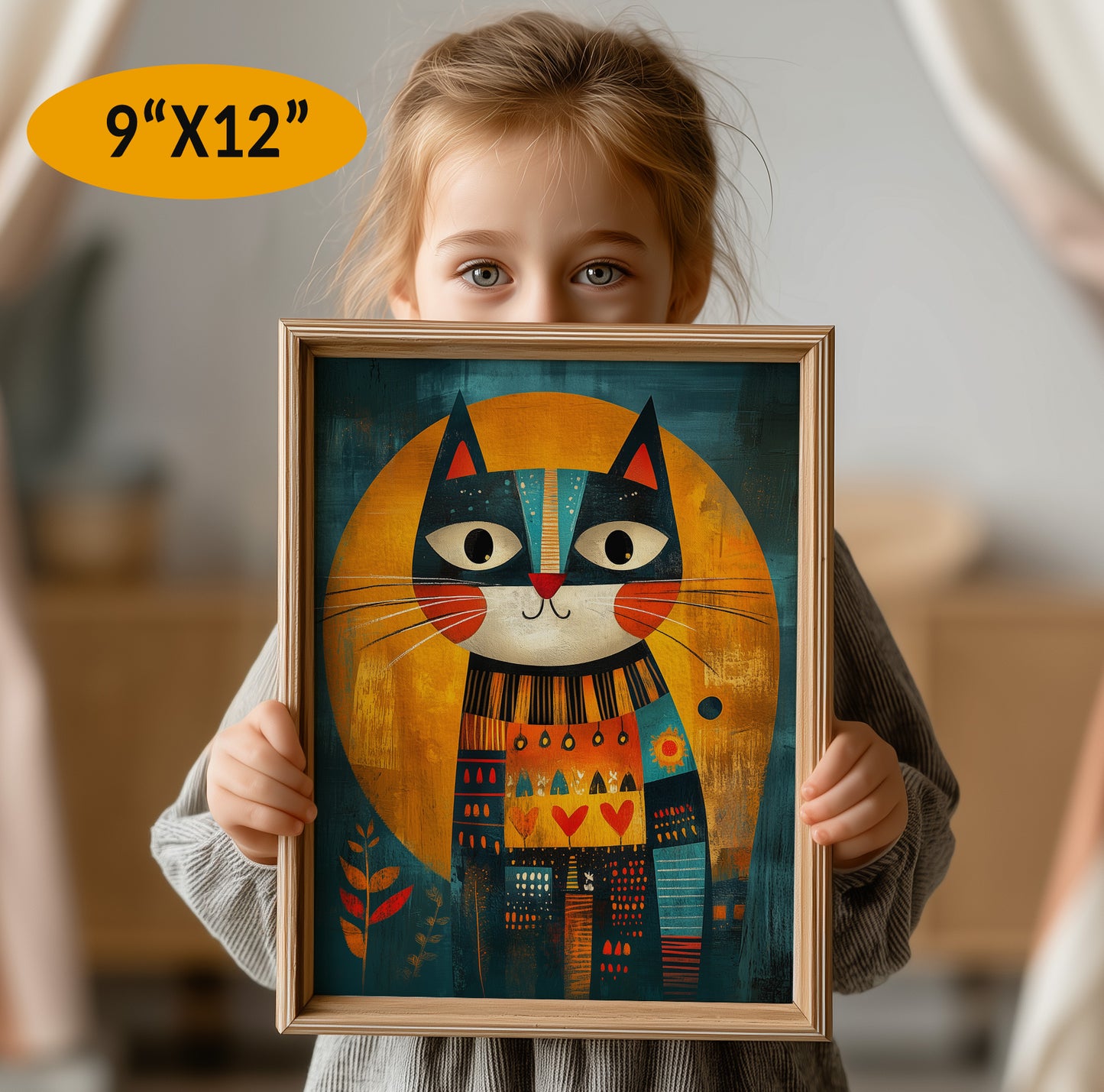 Child holding a framed illustration of a colorful cat with dimensions '9"x12"'.